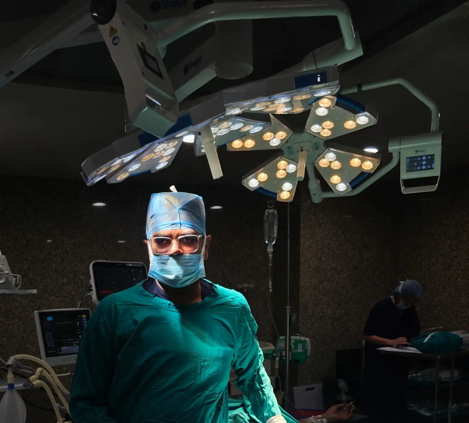 Dr. Ankit Kayal, experienced urologist in Jaipur, inside a modern operation theatre